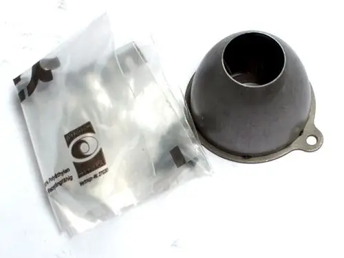 Daikin-Luftdüse in konischer Form, aus Metall, mit Anschlussöffnung. Begleitpackung im Hintergrund sichtbar.